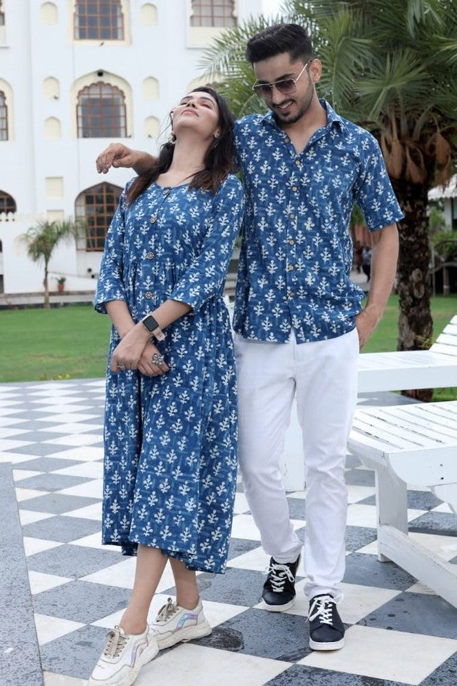 A coordinated duo set from Kimaari showcasing symmetrical artisan prints for both men and women.